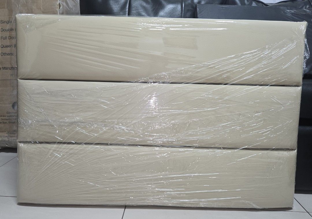 Headboard for single size bed (Category: Bed Frames & Mattresses) located in Manila. Submitted by kathrine031483 (Listing ID 1470644054, Image 1). Description: Headboard 1pc Horizontal Design (3) panels 36x24 inches Leather Cream With tape reason for selling - double order.