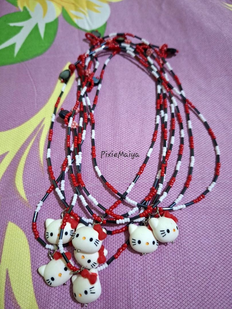 Hello Kitty beaded necklace red white black (Category: Necklaces) located in Valenzuela. Submitted by pixieworks64309 (Listing ID 1470667561, Image 1). Description: - Kawaii Kitty beaded necklace set - Features a stylish red, white, and black color combintion - Includes multiple strands bundled together - Fun and trendy Sanrio accessory.