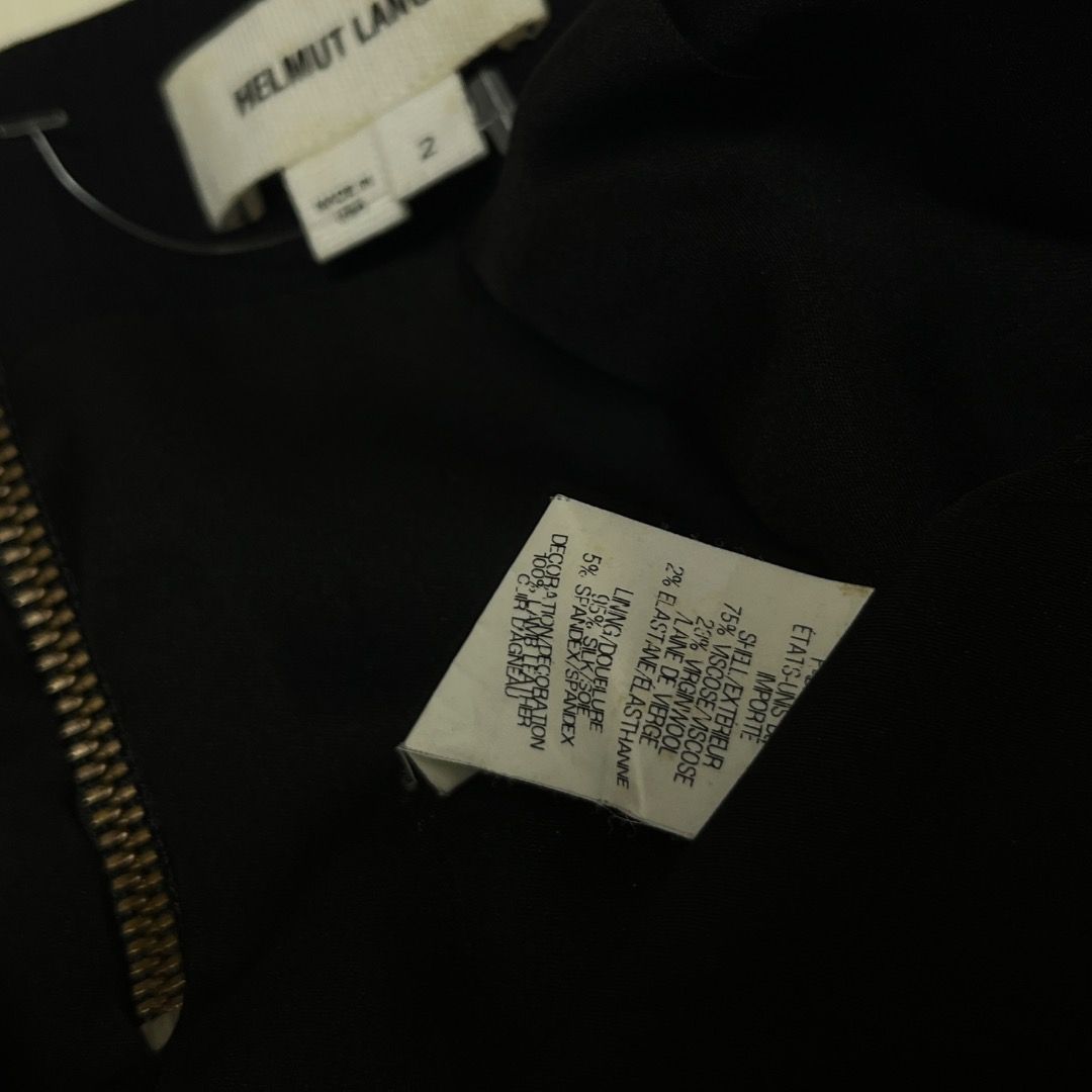 Helmut Lang Black Wool Leather Trim Mini Skirt Size 2 (Category: Skirts) located in Caloocan City. Submitted by achilles_grails (Listing ID 1470596799, Image 3). Description: - Brand: Helmut Lang - Color: Black - Size: 2 (Made in USA) - Material: Virgin wool blend with real leather trim - Lining: Silk blend - Closure: Exposed back zip - Condition: Sleek designer piece with great structural lines.