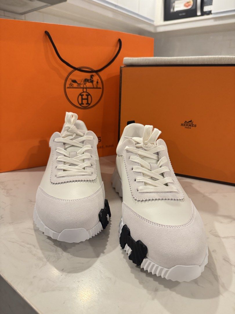 Hermes Bouncing Shoes (Category: Casual Shoes) located in Baguio. Submitted by justprei (Listing ID 1470722081, Image 3). Description: Hermes leather sneakers in white with suede details. Includes original orange box, dust bag, and paper shopping bag. Unworn condition, straight out of the box. Received as a gift..