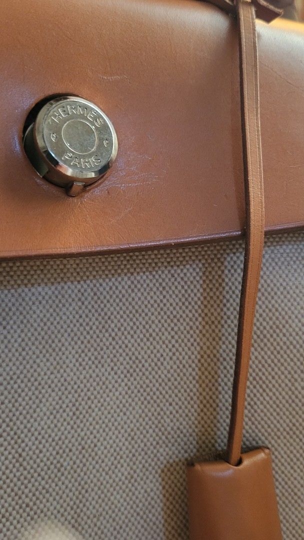 Hermes Herbag Toile De Sac 2way Backpack (Category: Luxury Bags & Wallets) located in Bulacan. Submitted by comkay (Listing ID 1470612353, Image 2). Description: Hermes Toile De Sac Herbag in Beige Canvas - Authentic - Calf Leather and Canvas Materials - Leather top handle - 2 in 1 Handbag or Backpack - With lock, keys clochette and care card, dustbag - minimal scratches and dents - From Japan - Can provide more photos if asked..