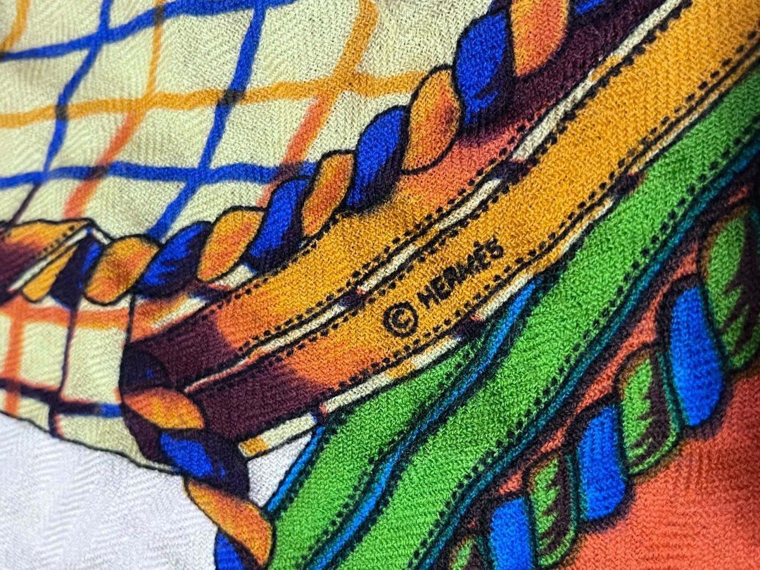 Hermès Silk Scarf Orange Blue Equestrian Design (Category: Scarves) located in Dagupan City. Submitted by fahionista1988 (Listing ID 1470707873, Image 2). Description: - Hermès silk scarf - Vibrant colorway in orange, blue, green, and white - Intricate equestrian theme with ropes, buckles, shields, crowns, and heraldic lions - Approximate dimensions: 46 x 47 inches - Signature hand-rolled edges - Hermès fabric label attached and visible in photos