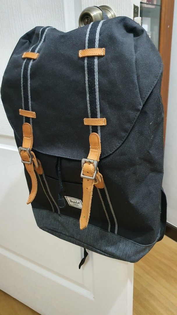 Herschel Supply Co. Retreat Backpack Black Tan Authentic (Category: Backpacks) located in Santa Rosa. Submitted by regcruz (Listing ID 1470639663, Image 3). Description: - Authentic Herschel backpack in sleek black canvas - Stylish tan leather strap details and classic woven front label - Secure main flap with dual pin-buckle fasteners and inner drawstring cinch - Convenient front stash pocket for quick-access items - Comfortable, padded, and adj
