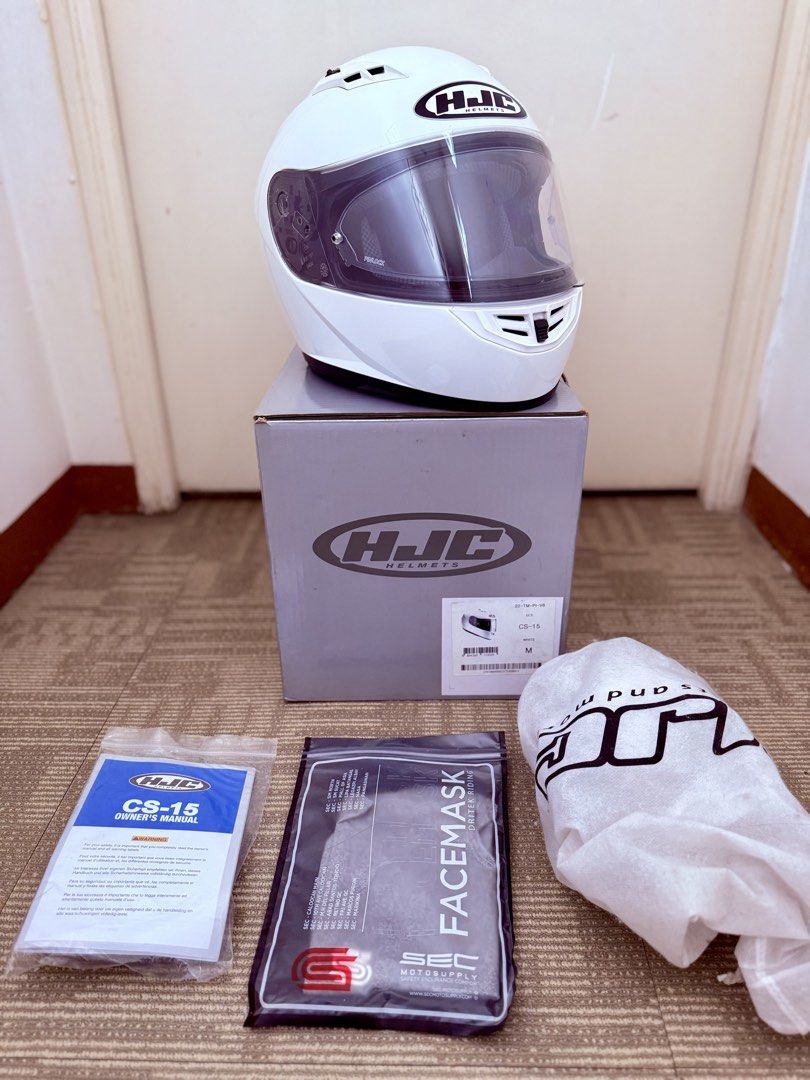 HJC CS-15 Full Face Helmet White Size M (Category: Helmets and other Riding Gears) located in Cainta. Submitted by yarhtennek (Listing ID 1470568275, Image 1). Description: - Brand: HJC CS-15 Full Face Motorcycle Helmet - Quick release - Color: Solid Gloss White - Size: Medium - Certification: ECE 22.05 approved - Condition: Sightly used - Visor: with Pinlock already - Inclusions: Original box, helmet bag, user manual, and a sealed SEC facemask, 