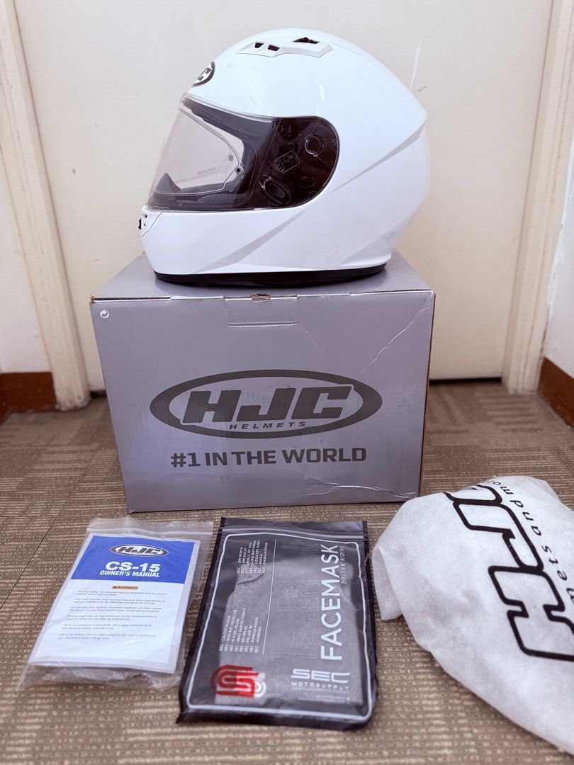 HJC CS-15 Full Face Helmet White Size M (Category: Helmets and other Riding Gears) located in Cainta. Submitted by yarhtennek (Listing ID 1470568275, Image 2). Description: - Brand: HJC CS-15 Full Face Motorcycle Helmet - Quick release - Color: Solid Gloss White - Size: Medium - Certification: ECE 22.05 approved - Condition: Sightly used - Visor: with Pinlock already - Inclusions: Original box, helmet bag, user manual, and a sealed SEC facemask, 