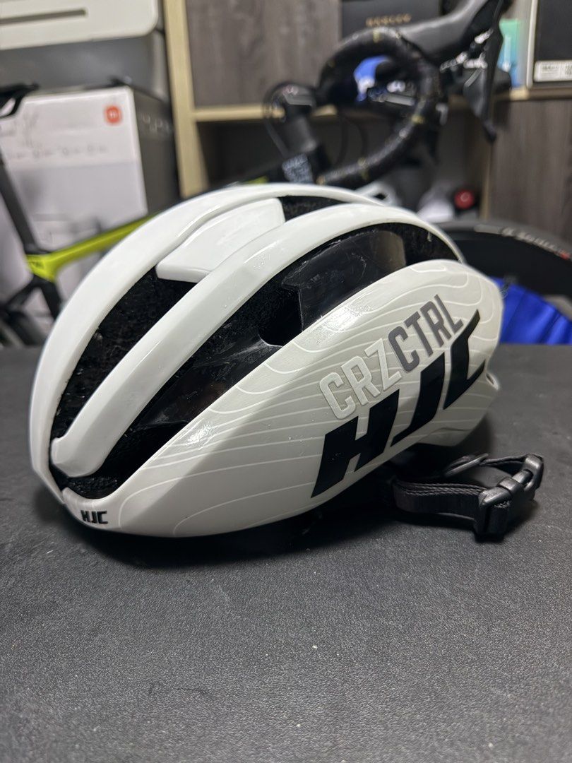 HJC Ibex 2.0 Legit (Category: Bicycles) located in Quezon City. Submitted by ronsatch (Listing ID 1470635789, Image 2). Description: - Brand: HJC Ibex 2.0 Legit - Color: Clean white with subtle graphic lines - Design: Aerodynamic shape with deep front and side ventilation channels - Fit: Adjustable chin strap with secure buckle closure - Condition: Oversprayed a clear coat on some parts of the inner shell / Ready for use.