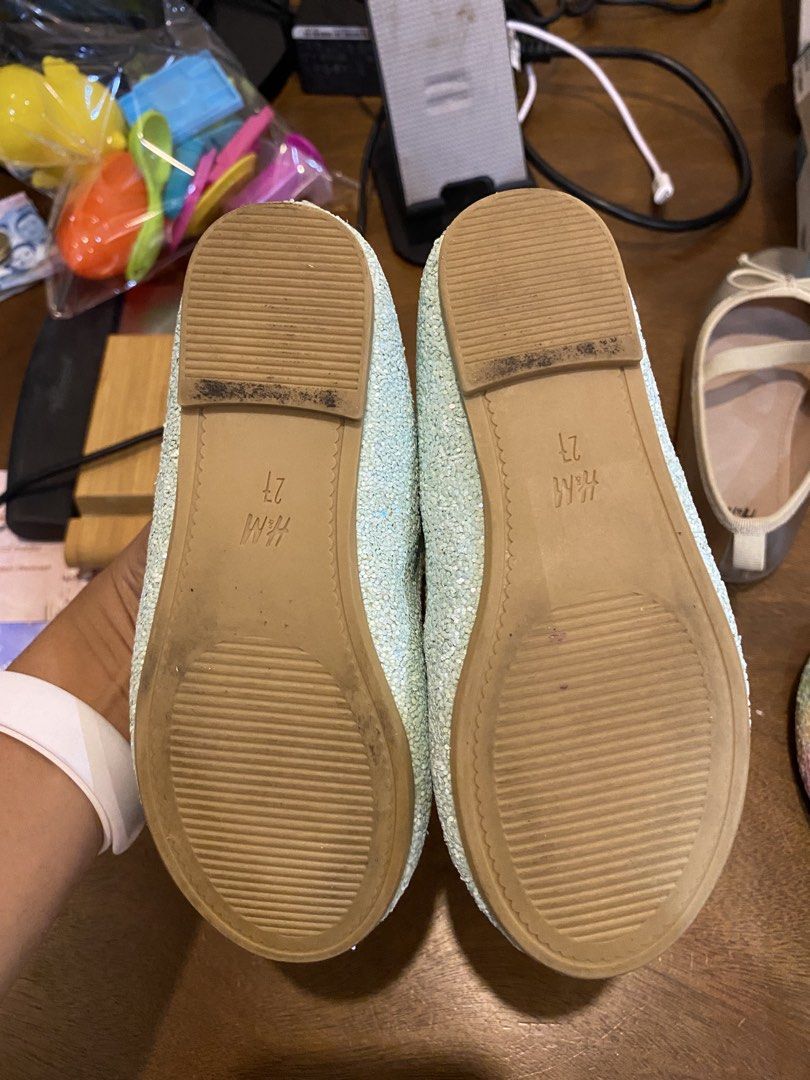 H&M Ballet Flats Bundle (Category: Babies & Kids Fashion) located in Santa Rosa. Submitted by hoardqueensdeclutter (Listing ID 1470676713, Image 2). Description: Bundle of three pairs of H&M kids ballet flats. Includes light blue glitter flats with Princess Jasmine insoles in size 27, multi-color rainbow glitter flats in size 26, and metallic gold flats. All feature elastic straps and front bows. Soles show minor scuffs and wear from normal use, 