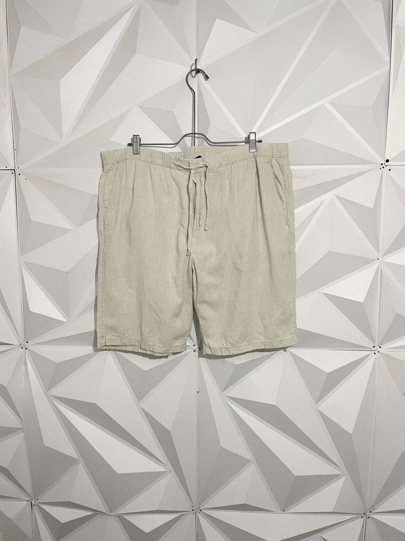 H&M Beige Linen Drawstring Shorts (Category: Swim Trunks & Board Shorts) located in Cabuyao City. Submitted by ParadisethriftedPh (Listing ID 1470648587, Image 1). Description: Cr: 9.5/10 Dimensions Waist: 40 Length: 20 - Color: Beige - Material: Lightweight linen, perfect for warm weather - Waistband: Elastic with adjustable drawstring and zip fly - Pockets: Deep front pockets and a single back pocket - Condition: Clean overall.