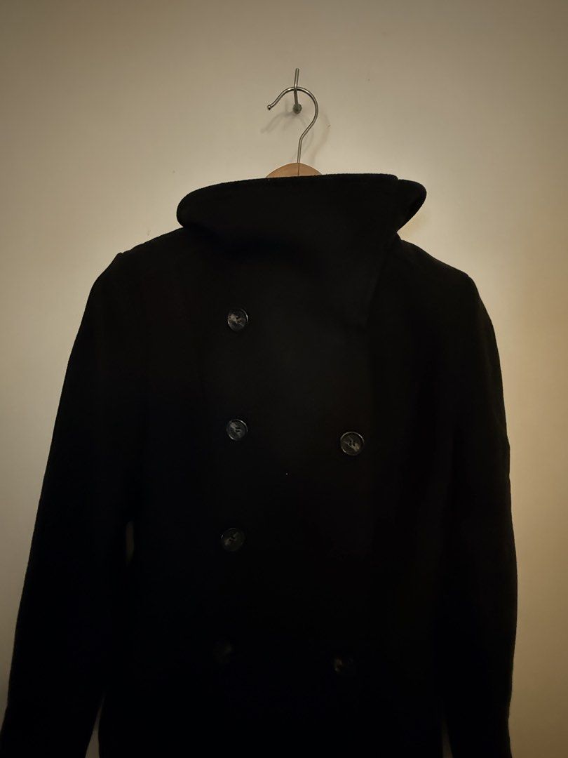 H&M Black Double Breasted Wool Coat with Oversized Collar (Category: Coats, Jackets and Outerwear) located in Manila. Submitted by amdra25 (Listing ID 1470577776, Image 2). Description: - Brand: H&M - Color: Classic Black - Style: Double-breasted winter coat with dark buttons and mid-length cut - Features: High oversized collar for wind protection, structured shoulders, and back waist tab detail - Condition: Clean fabric, zero fading, ready to we
