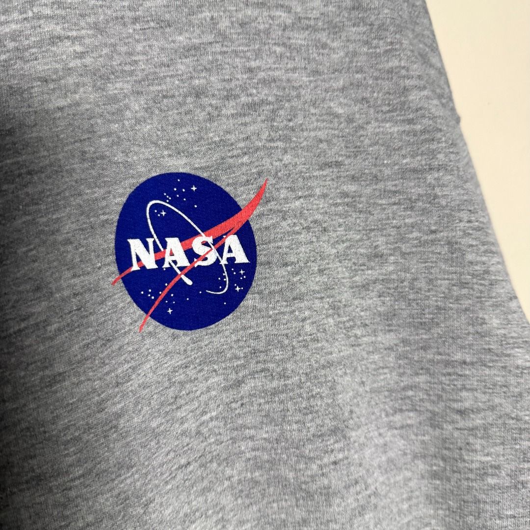 H&M Divided NASA Gray Pullover Sweatshirt (Category: Coats, Jackets and Outerwear) located in Tanauan. Submitted by rubymotilla (Listing ID 1470675094, Image 2). Description: H&M Divided NASA Gray Pullover Sweatshirt | S Measurements: 20 inches pit to pit × 24.5 inches length Condition: Please refer to the actual photos. Feel free to message me for more details 😊.