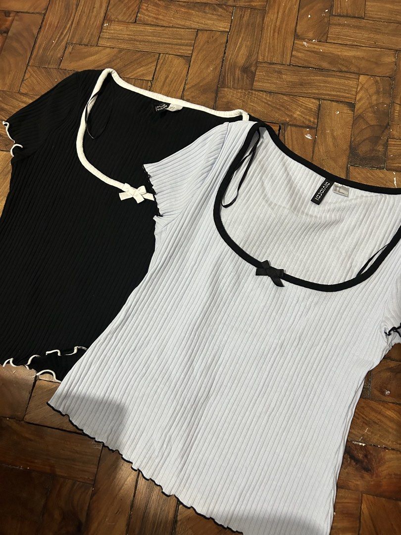 H&M Divided Ribbed Bow Tops Set (Category: Shirts) located in Sorsogon. Submitted by jonacel (Listing ID 1470676367, Image 3). Description: - Brand: H&M Divided - Set of 2 ribbed tops (Black with white trim, Light blue with black trim) - Size: M - Details: Scoop neck with mini bows, trendy lettuce hem on sleeves and hemline - Condition: Great as daily basic wear - Take both for 250 - Each for 150.