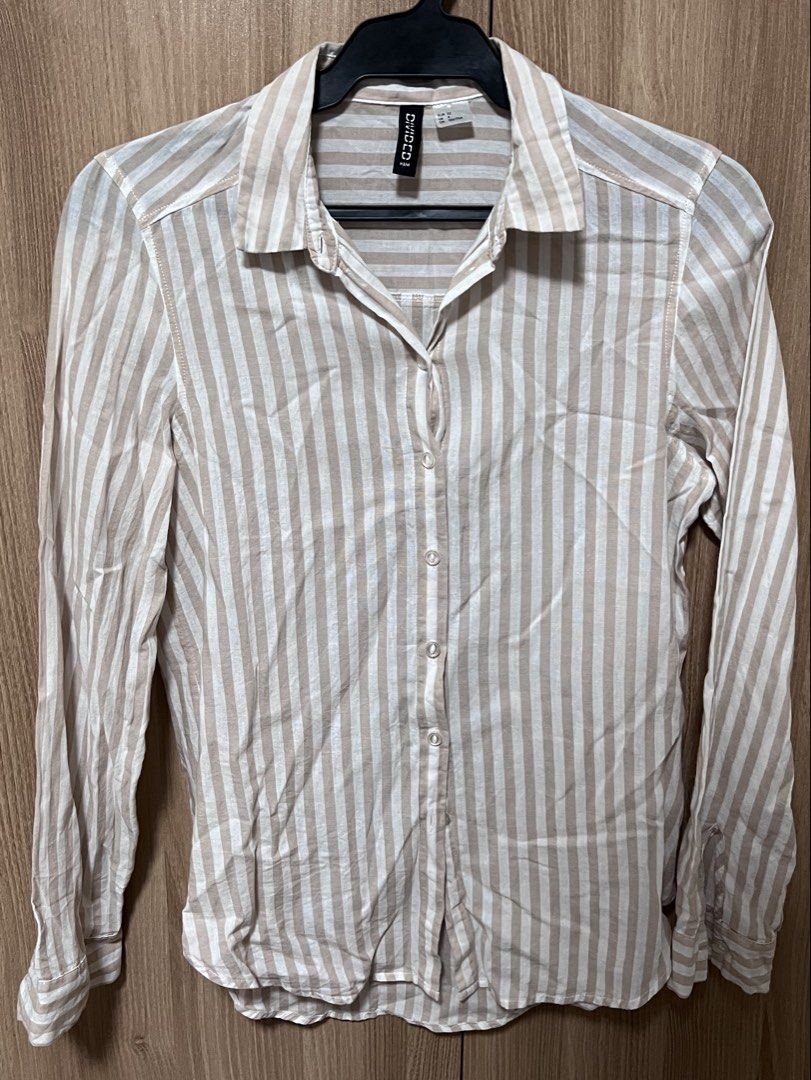 H&M Divided Striped Long Sleeve Button-Down Shirt (Category: Longsleeves) located in Manila. Submitted by sph_preloved (Listing ID 1470704570, Image 1). Description: Price not negotiable unless buying at least 5 items. No ww photos. Location: QC Mode of delivery: grab/lalamove SF to be shouldered by the buyer .