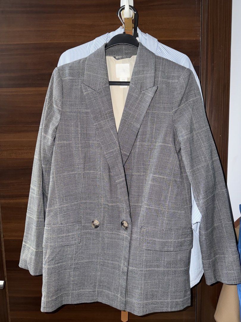 H&M Grey Plaid Double-Breasted Blazer Size XS (Category: Coats, Jackets and Outerwear) located in Mandaluyong City. Submitted by kadynkelsey (Listing ID 1470667938, Image 1). Description: - Brand/Model: H&M Grey Plaid Double-Breasted Blazer - Size: US XS (Made in Bangladesh) - Material & Lining: Fully lined in beige with clean, structured fabric - Design: Notched lapels, structured shoulders, two-button closure, and front flap pockets - Condition