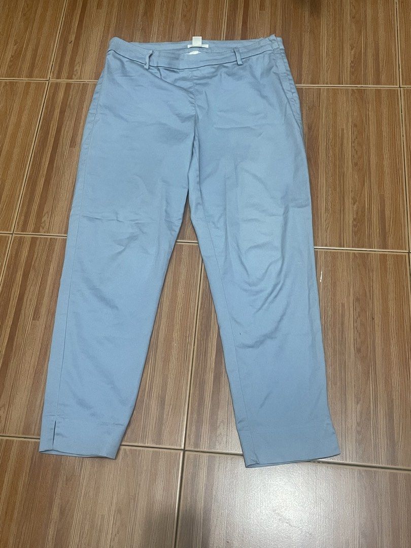 H&M Light Blue Casual Pants Size US 12 (Category: Jeans) located in Cainta. Submitted by nancygoreng (Listing ID 1470625376, Image 1). Description: - Brand: H&M - Color: Light blue - Size: US 12 / EUR 42 - Fit: Fitted waistband with belt loops and regular cut through the leg - Details: Trendy split hem at the ankle and a single back pocket - Condition: Clean fabric overall.