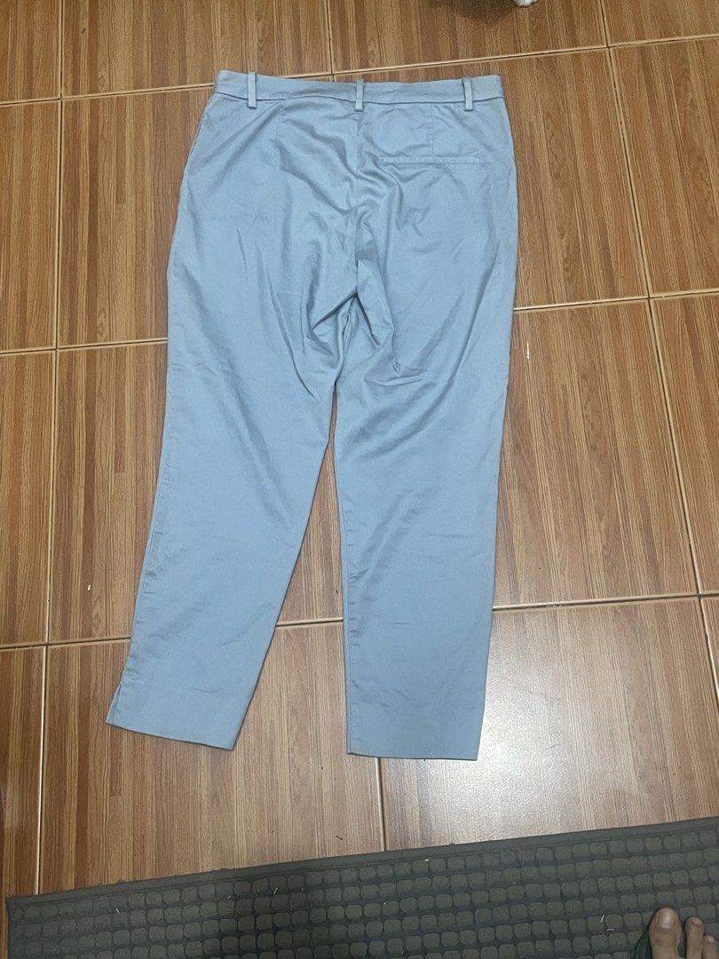 H&M Light Blue Casual Pants Size US 12 (Category: Jeans) located in Cainta. Submitted by nancygoreng (Listing ID 1470625376, Image 3). Description: - Brand: H&M - Color: Light blue - Size: US 12 / EUR 42 - Fit: Fitted waistband with belt loops and regular cut through the leg - Details: Trendy split hem at the ankle and a single back pocket - Condition: Clean fabric overall.
