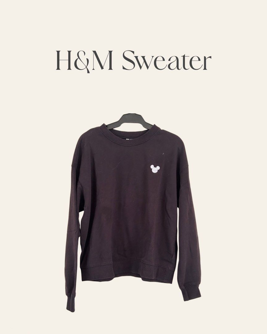 H&M Mickey Mouse Black Sweatshirt (Category: Coats, Jackets and Outerwear) located in Paranaque City. Submitted by jackie.g (Listing ID 1470597391, Image 1). Description: - Brand: H&M - Color: Black with small white Mickey Mouse silhouette on left chest - Design: Crew neck, long sleeves, ribbed cuffs and hem, plain back - Material: Soft and comfortable cotton blend - Fit: True to size, great for casual everyday outfits - Condition: Excellent.