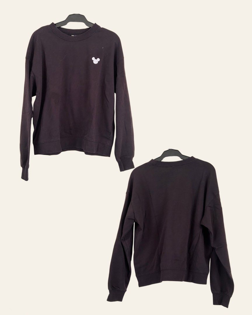 H&M Mickey Mouse Black Sweatshirt (Category: Coats, Jackets and Outerwear) located in Paranaque City. Submitted by jackie.g (Listing ID 1470597391, Image 2). Description: - Brand: H&M - Color: Black with small white Mickey Mouse silhouette on left chest - Design: Crew neck, long sleeves, ribbed cuffs and hem, plain back - Material: Soft and comfortable cotton blend - Fit: True to size, great for casual everyday outfits - Condition: Excellent.