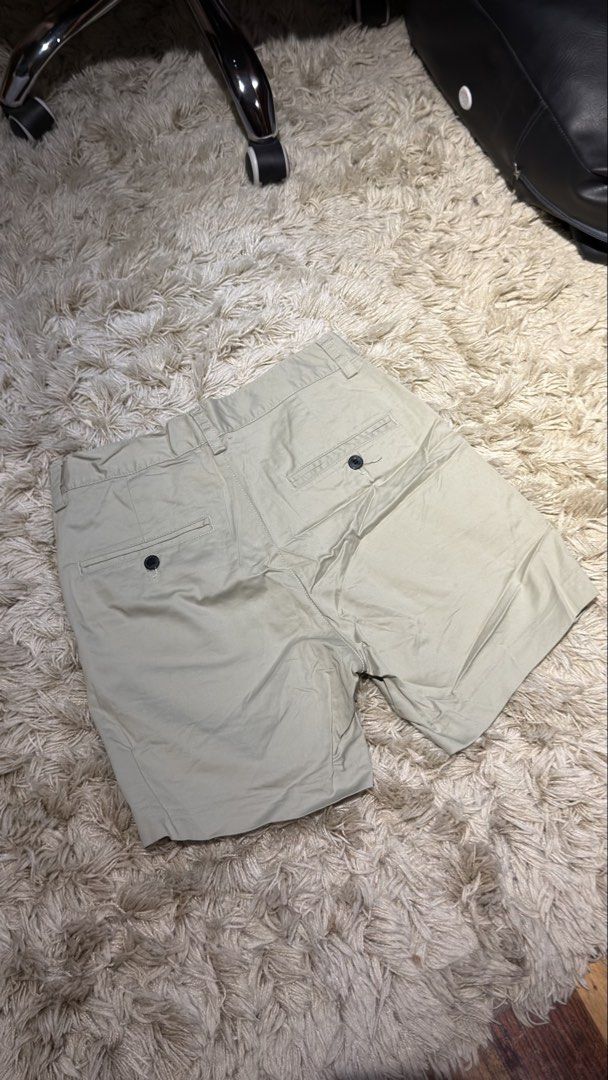 H&M Regular Fit Olive Green Shorts Size 28 (Category: Shorts) located in Manila. Submitted by kyle.daniel (Listing ID 1470650981, Image 3). Description: - Brand: H&M - Style: Regular fit casual shorts - Color: Khaki beige - Size: US 28 / EUR 28 - Closure: Standard button with zipped fly - Pockets: 2 front slip pockets, 2 buttoned back pockets - Condition: Excellent, clean with no stains or damage.