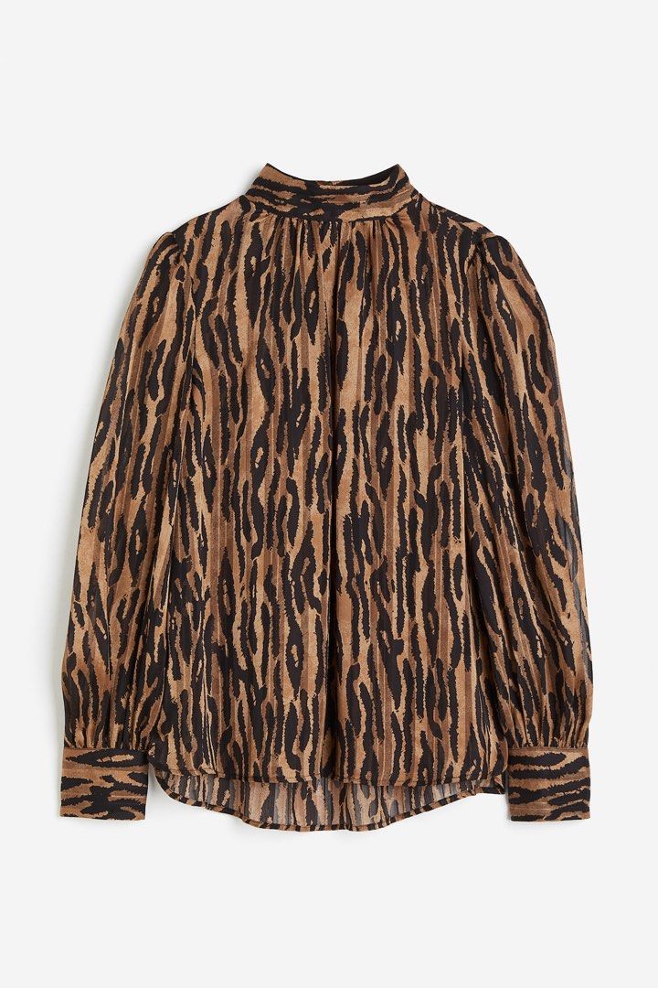 H&M Zebra Print High-Neck Longsleeves (Category: Blouses) located in Quezon City. Submitted by dropdeadprices (Listing ID 1470630872, Image 1). Description: - Brand: H&M New and unused and still in the hm website; only removed tags - Print: Brown and black zebra print - Size: EUR S / US S - Details: High neckline with back button closure, long sleeves with buttoned cuffs 21 inches pit to pit when laid flat x 25 inches length.