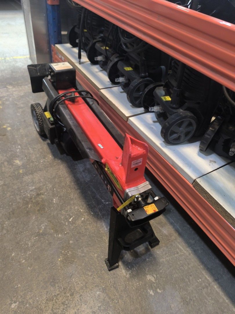 Homelite Electric Log Splitter 2200W (Category: Construction Tools & Equipment) located in Dasmarinas. Submitted by bossgabo (Listing ID 1470585517, Image 2). Description: - Brand: Homelite Electric Log Splitter (Red and Black) - Condition: Great working condition, powers on easily with push button - Build: Heavy-duty steel beam with built-in electric motor - Portability: Equipped with sturdy support legs and rolling wheels for easy yard transpor