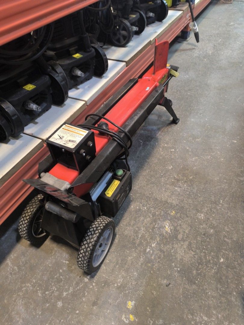 Homelite Electric Log Splitter 2200W (Category: Construction Tools & Equipment) located in Dasmarinas. Submitted by bossgabo (Listing ID 1470585517, Image 3). Description: - Brand: Homelite Electric Log Splitter (Red and Black) - Condition: Great working condition, powers on easily with push button - Build: Heavy-duty steel beam with built-in electric motor - Portability: Equipped with sturdy support legs and rolling wheels for easy yard transpor
