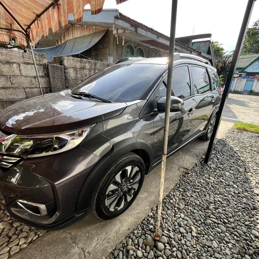 Honda BR-V (Category: Used Cars) located in Bayombong. Submitted by jon_russel19 (Listing ID 1470741090, Image 2). Description: Honda BRV 2021 model Honda BRV 2021 model Mid Variant AT Grey -Spacious 7-Seater: Perfect for family trips and daily commutes with flexible second and third-row seating. -Powerful & Efficient Engine: Equipped with a dependable 1.5L i-VTEC engine, ideal powertrain for highway drives.” -Smooth Drive: Regular maintenance is