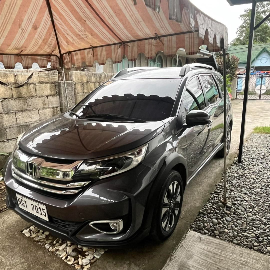 Honda BR-V (Category: Used Cars) located in Bayombong. Submitted by jon_russel19 (Listing ID 1470741090, Image 1). Description: Honda BRV 2021 model Honda BRV 2021 model Mid Variant AT Grey -Spacious 7-Seater: Perfect for family trips and daily commutes with flexible second and third-row seating. -Powerful & Efficient Engine: Equipped with a dependable 1.5L i-VTEC engine, ideal powertrain for highway drives.” -Smooth Drive: Regular maintenance is