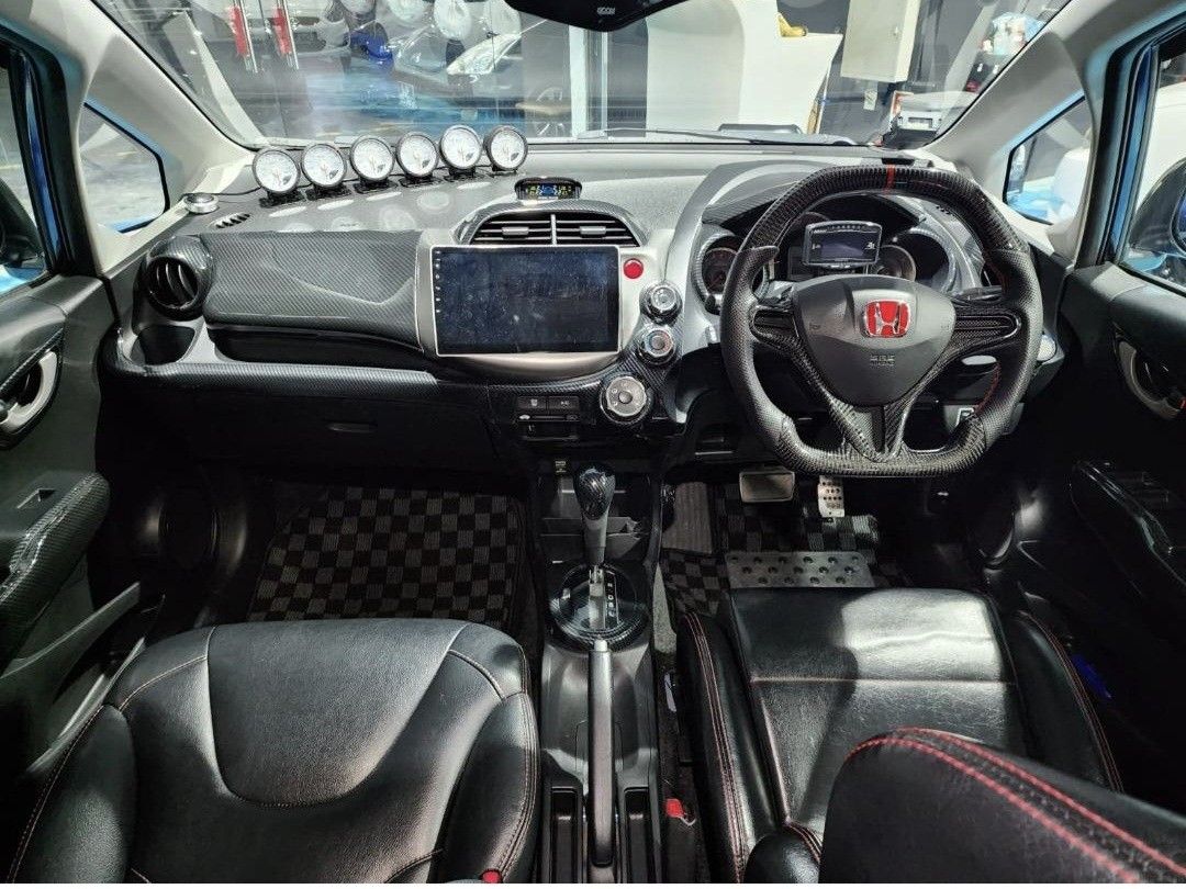 Honda Fit 1.3 G (A) (Category: Used Cars) located in Singapore. Submitted by k.teetan07 (Listing ID 1470688944, Image 3). Description: wear & tear done up with receipts proof. new tyres & front rotor with receipts proof. new coilover D2 racing with receipt proof. done dyno tuning on September 2026. legal drift racing exhaust with cert. super nice interior + carbon steering + defi. new bodykit. many more, open to view at night... etc etc....