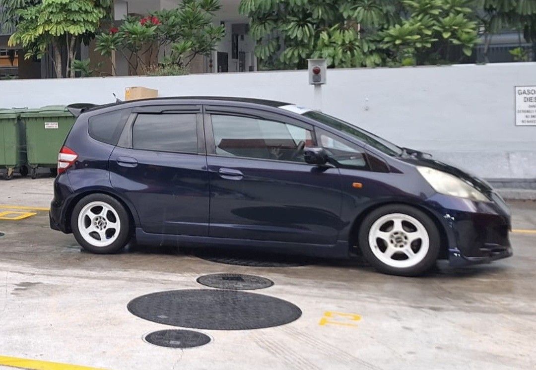 Honda Fit 1.3 G (A) (Category: Used Cars) located in Singapore. Submitted by k.teetan07 (Listing ID 1470688944, Image 2). Description: wear & tear done up with receipts proof. new tyres & front rotor with receipts proof. new coilover D2 racing with receipt proof. done dyno tuning on September 2026. legal drift racing exhaust with cert. super nice interior + carbon steering + defi. new bodykit. many more, open to view at night... etc etc....