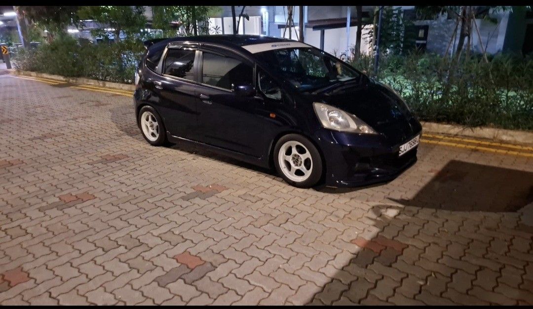 Honda Fit 1.3 G (A) (Category: Used Cars) located in Singapore. Submitted by k.teetan07 (Listing ID 1470688944, Image 1). Description: wear & tear done up with receipts proof. new tyres & front rotor with receipts proof. new coilover D2 racing with receipt proof. done dyno tuning on September 2026. legal drift racing exhaust with cert. super nice interior + carbon steering + defi. new bodykit. many more, open to view at night... etc etc....