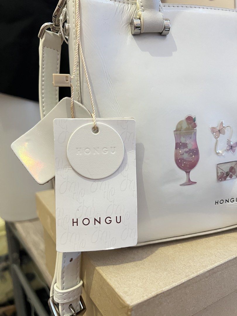 Hongu top handle with sling (Category: Cross-body Bags) located in Quezon City. Submitted by handpicked_collections_ph (Listing ID 1470660600, Image 2). Description: .
