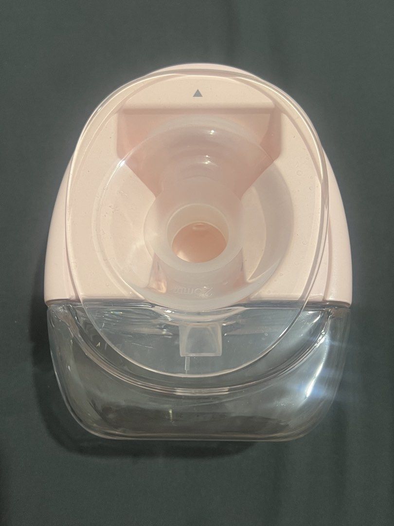 Horigen Portable Electric Breast Pump - Pink 1 pc (Category: Breastfeeding & Bottle Feeding) located in Manila. Submitted by myrs23 (Listing ID 1470683997, Image 2). Description: Tried only thrice (cant produce milk so i gave up pumping 😫) The spare parts are unused (the ones inside the sealed plastic) - Brand: Horigen Electric Breast Pump - Color: Pink - Flange Size: 25mm - Includes: Motor unit, collection cup, funnel, valve, and sealed spare a