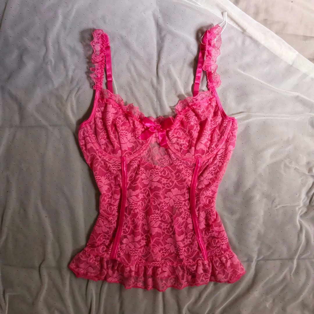 Hot Pink Lace Cami Corset (Category: Sleeveless) located in Manila. Submitted by electricpetals (Listing ID 1470703741, Image 1). Description: - Size: XS-S - Details: Satin ribbon bow at the bust, ruffled trim on edges and hem - Straps are adjustable and ruffled - Condition: Brand new / Excellent - Mode of Payment: GCash, BPI, or Bank Transfer - Shipping: Via J&T Express or Same-Day Delivery (Metro Manila only).