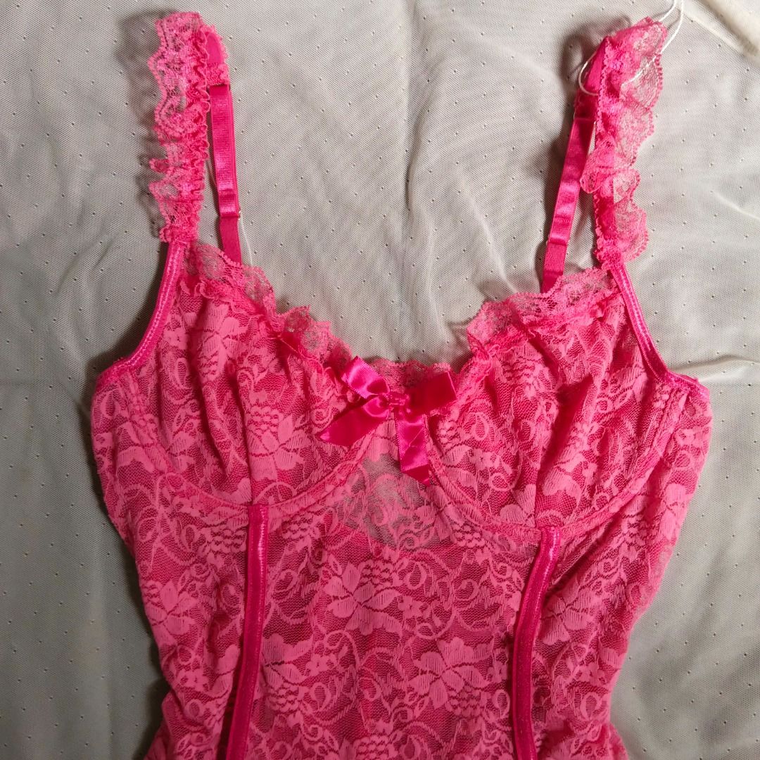 Hot Pink Lace Cami Corset (Category: Sleeveless) located in Manila. Submitted by electricpetals (Listing ID 1470703741, Image 2). Description: - Size: XS-S - Details: Satin ribbon bow at the bust, ruffled trim on edges and hem - Straps are adjustable and ruffled - Condition: Brand new / Excellent - Mode of Payment: GCash, BPI, or Bank Transfer - Shipping: Via J&T Express or Same-Day Delivery (Metro Manila only).