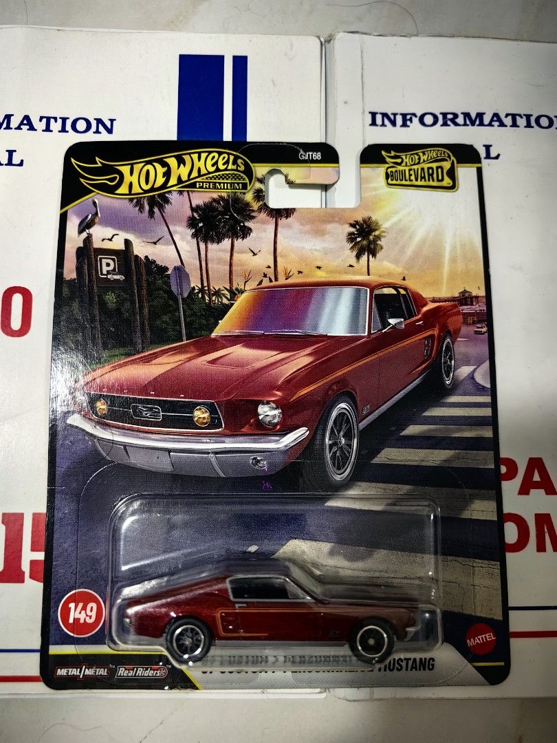 Hot Wheels Boulevard Custom '68 Ford Mustang (Category: Vehicle & Diecast Models) located in Manila. Submitted by jamesbrosn30064 (Listing ID 1470576405, Image 1). Description: Hot Wheels Boulevard Custom '68 Ford Mustang (#149) in stunning metallic red. Features a metal body and base, Real Riders rubber tires, and a tropical palm tree card art. Perfect for collectors and Mustang fans!.