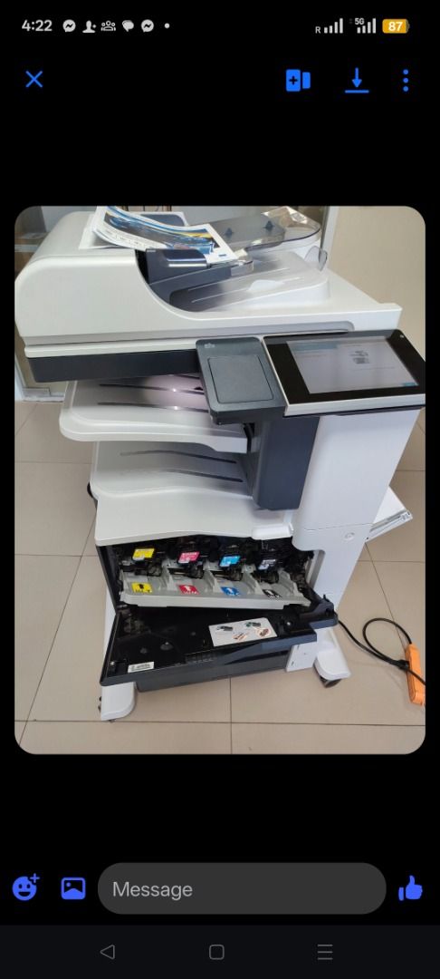 HP Office Enterprise Color MFP (Category: Printers, Scanners & Copiers) located in Caloocan City. Submitted by copiermach60483 (Listing ID 1470630983, Image 2). Description: - Type: Heavy-duty multi-function color printer and copier - Features: Built-in scanner tray, touchscreen control panel, and easy-access toner compartment - Capacity: Multiple paper drawers underneath for high-volume printing - Condition: Powers on and fully ready for a busy 