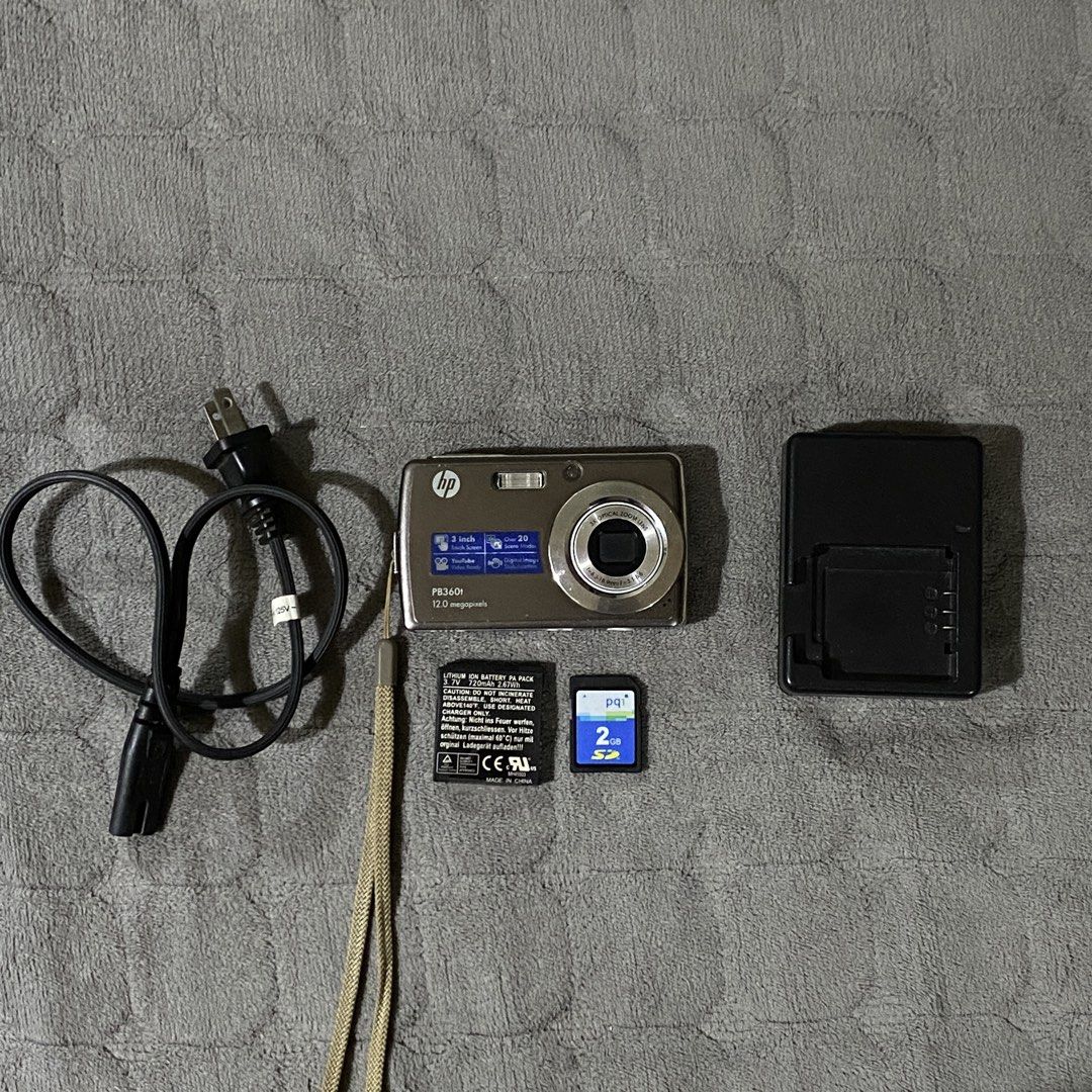 HP PB360t Digital Camera (Digicam) TOUCHSCREEN in SILVER with ACCESSORIES ! (Category: Cameras) located in Manila. Submitted by hailtothefilm (Listing ID 1470700965, Image 2). Description: 📸 HP PB360t Digital Camera (Digicam) TOUCHSCREEN in SILVER with ACCESSORIES ! for Sale 3, 599 ! DESCRIPTION: ✅in PRISTINE body condition. ✅ crisp outputs ✅Tested, fully functioning. ✅ Fully functioning LCD, all sides ✅ 12.0 megapixel ✅ 3.0 inches screen ✅ One 