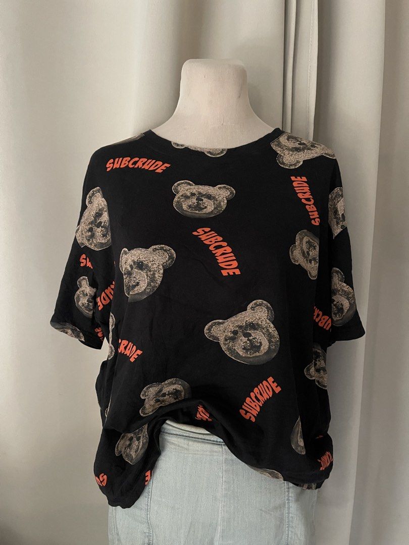 HQ Black Graphic Bear oversize (Category: Shirts) located in Cainta. Submitted by zlove111 (Listing ID 1470708274, Image 2). Description: - Color: Black with all-over teddy bear print and bright orange Subcrude text - Fit: Relaxed fit, short sleeves, crew neck - Material: Soft, comfortable cotton fabric for everyday wear - Style: Perfect for casual streetwear looks - up to xl .
