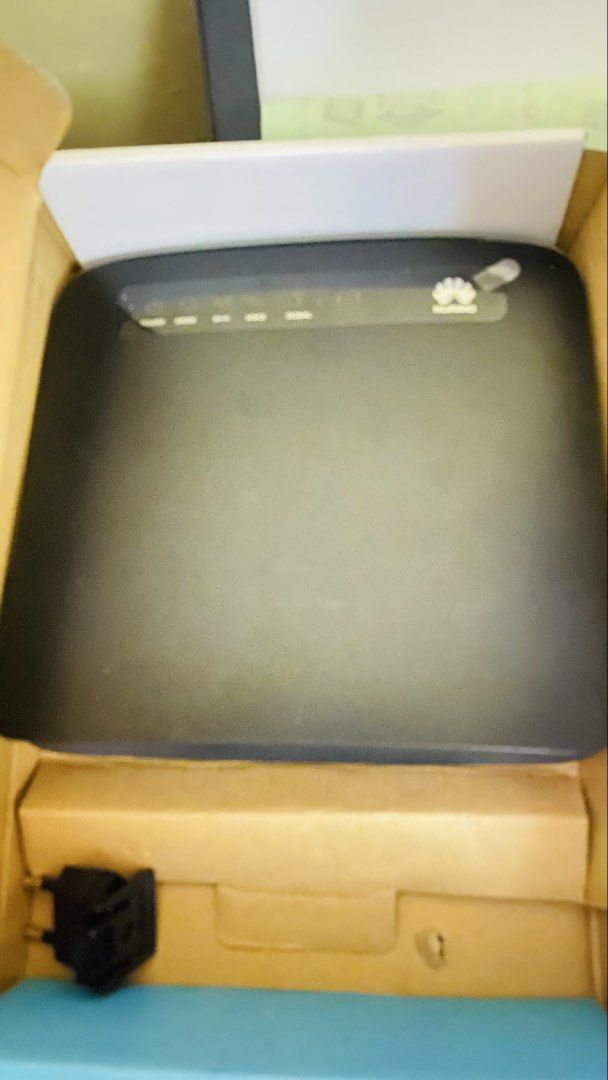 Huawei LTE CPE E5186s - 22a Router (Category: Networking) located in Manila. Submitted by boldfire_5aad05 (Listing ID 1470714079, Image 1). Description: - Model: Huawei LTE CPE E5186 Router (Black) - Condition: Powers on and works great for home networks - Inclusions: Original box and power adapter - Features: Multiple LAN ports, telephone ports, side SIM card slot, rear external antenna connectors, and power switch - Perfect for boosting home or