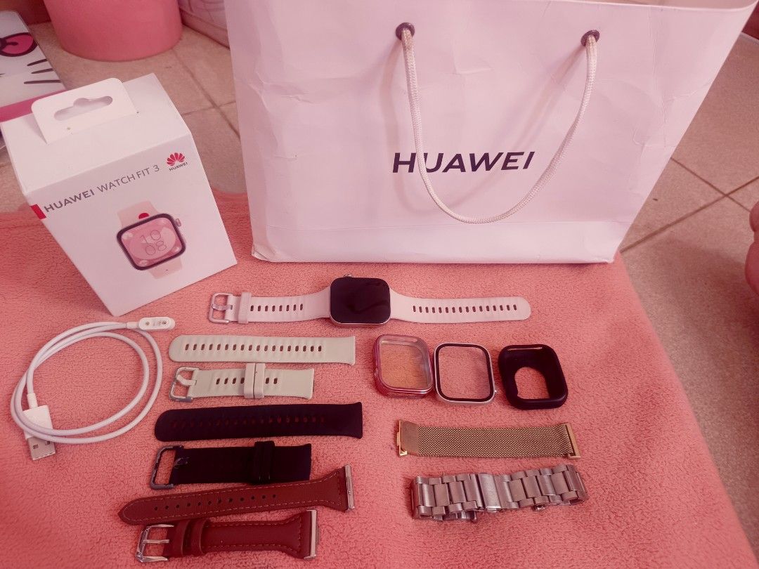 Huawei smart watch fit 3 (Category: Wearables & Smart Watches) located in Manila. Submitted by cleverearth.ed94b6 (Listing ID 1470664128, Image 1). Description: - Brand/Model: Huawei Watch Fit 3 - Condition: Excellent, well-maintained - Inclusions: Original box, official paper bag, and magnetic charging cable - Straps included: Multiple interchangeable straps (rubber, leather, metal mesh, and stainless steel link) - Protectors: Includes several p