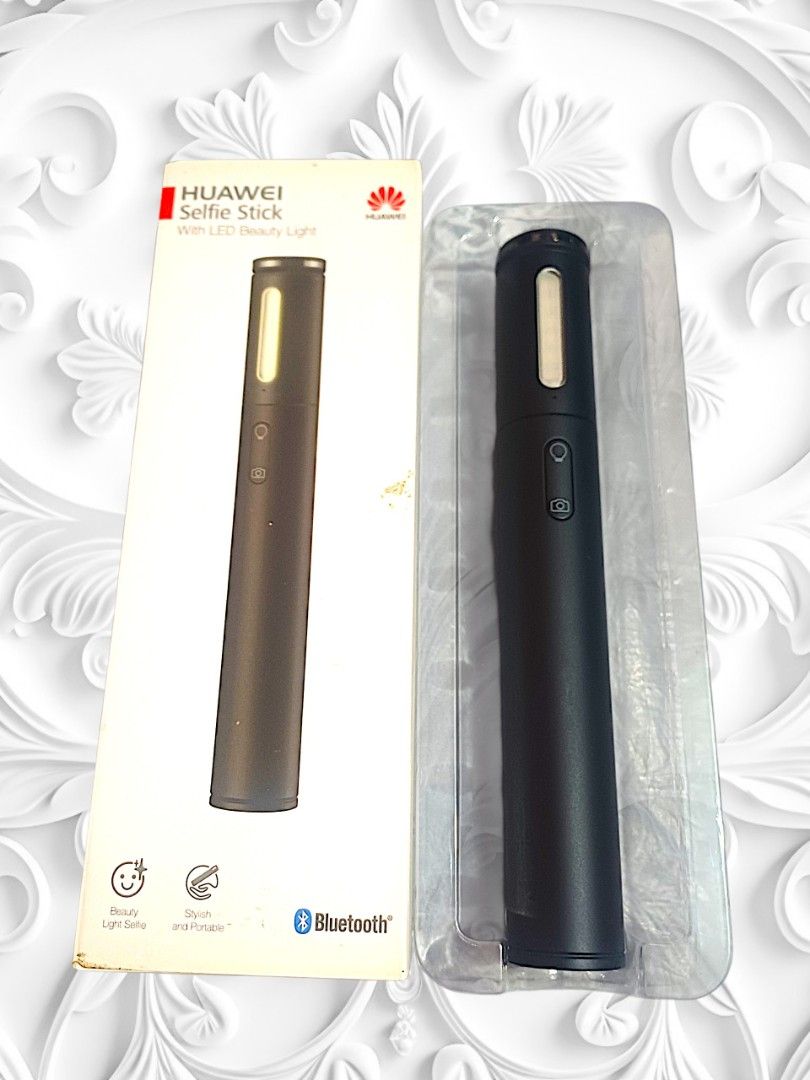 Huawei Speaker and Selfie stick (Category: Everything Else Others) located in Taguig. Submitted by queens_fashion (Listing ID 1470569224, Image 2). Description: - Brand: Huawei original product - Features: Built-in LED beauty light and wireless Bluetooth connectivity - Design: Compact black handle with easy-to-use control buttons - Inclusions: Complete with original retail packaging box - Best for: Night selfies, vlogs, and mobile photography ent