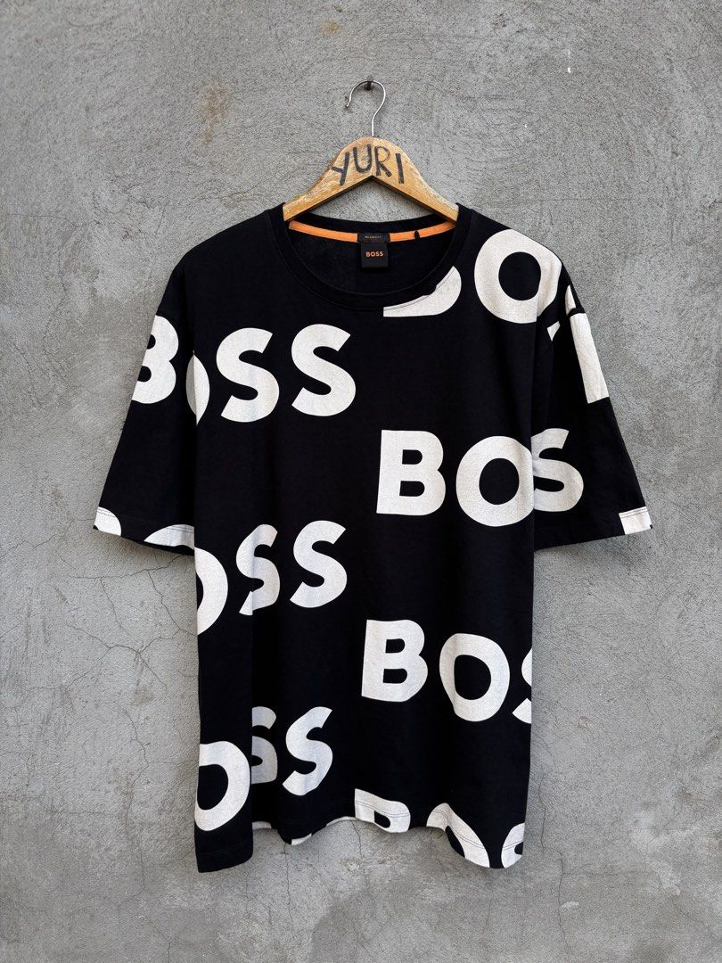 Hugo BOSS All Over Logo Tshirt (Category: Formal Shirts) located in Davao. Submitted by lumpiashanghai (Listing ID 1470595932, Image 3). Description: Hugo BOSS All Over Logo Tshirt Width 25, Length 29 Excellent Condition No issue & Need wash 1,600 +shipping .