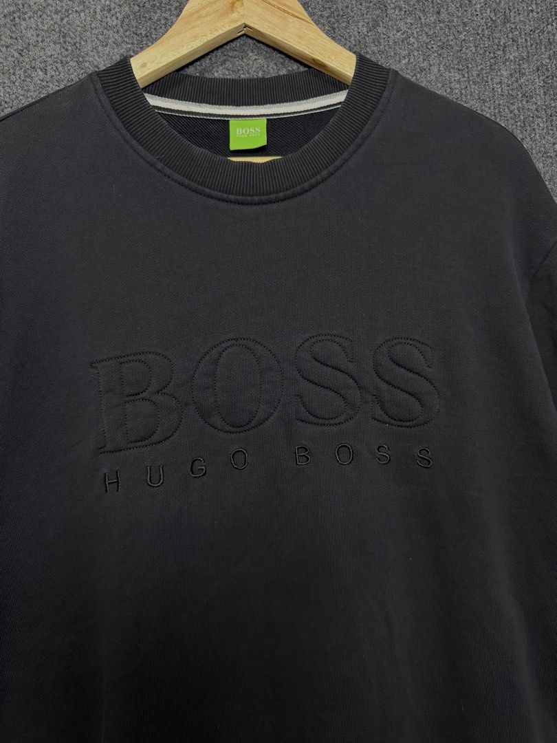 HUGO BOSS Black Embroidered Logo Sweatshirt (Category: Coats, Jackets and Outerwear) located in Baguio. Submitted by thriftcoded_2600 (Listing ID 1470606206, Image 2). Description: - Brand: Hugo Boss - Color: Classic Black - Size: XL - Condition: Excellent, - Shipping: Via J&T Express -Color Rate:9.8/10.