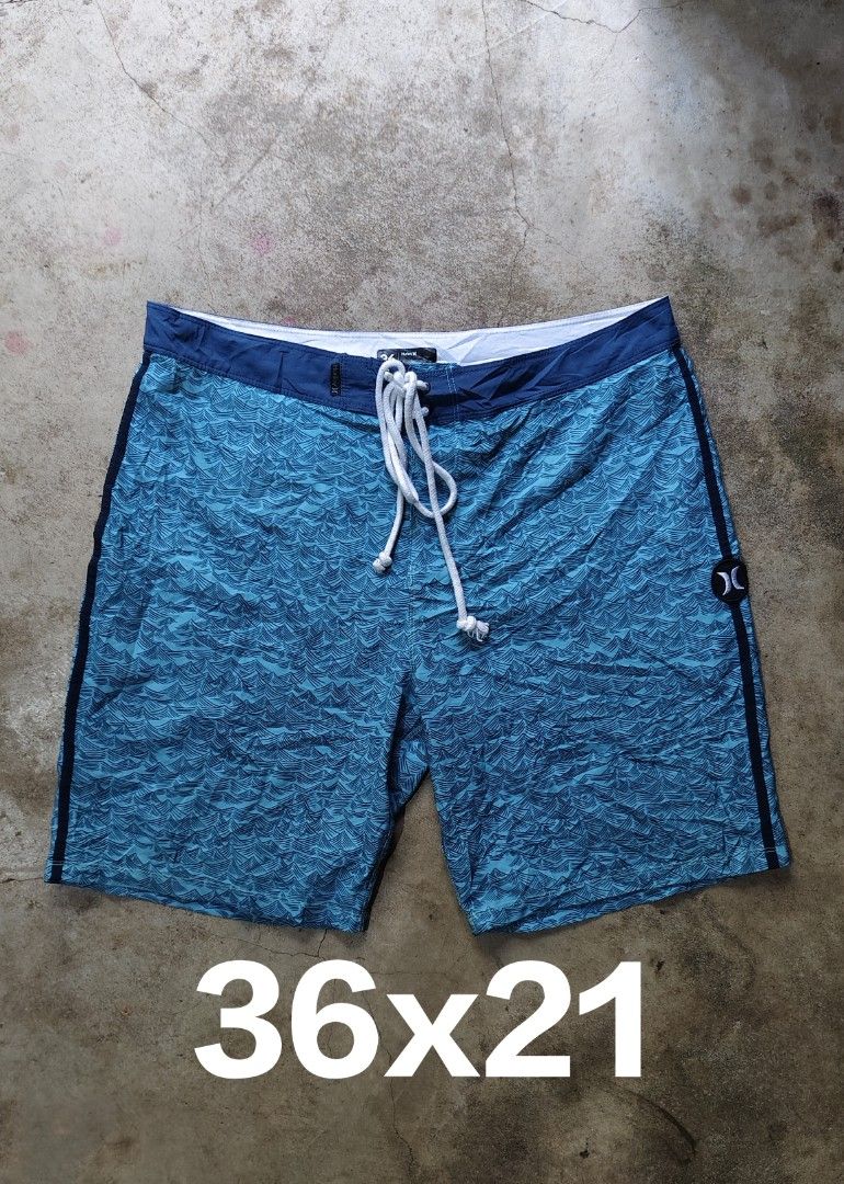 Hurley Phantom Blue Wave Print Boardshorts Size 36 (Category: Swim Trunks & Board Shorts) located in Quezon City. Submitted by truedeer_cda94c (Listing ID 1470605158, Image 1). Description: - Brand: Hurley - Color: Blue with all-over wave pattern - Size: 36 waist - Length: 21 inches - Closure: Front drawstring - Pockets: Back pocket with velcro flap and brand patch - Details: Round Hurley logo patch on left leg and clean interior tags - Condition