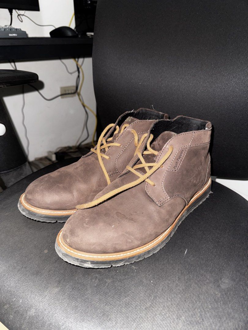 Hush Puppies Jenson Chuka M (Category: Casual Shoes) located in Calamba. Submitted by jusginmemymoney (Listing ID 1470709573, Image 1). Description: NOT THRIFTED‼️ Brand/Model: Hush Puppies Leather Ankle Boots Color: Dark Brown with contrast tan laces Features: Textured fabric collar lining, lightweight Condition: Uppers in solid shape, soles show minor dirt from previous wear Size: 11 Complete with box and paper bag Negotiable just offer.