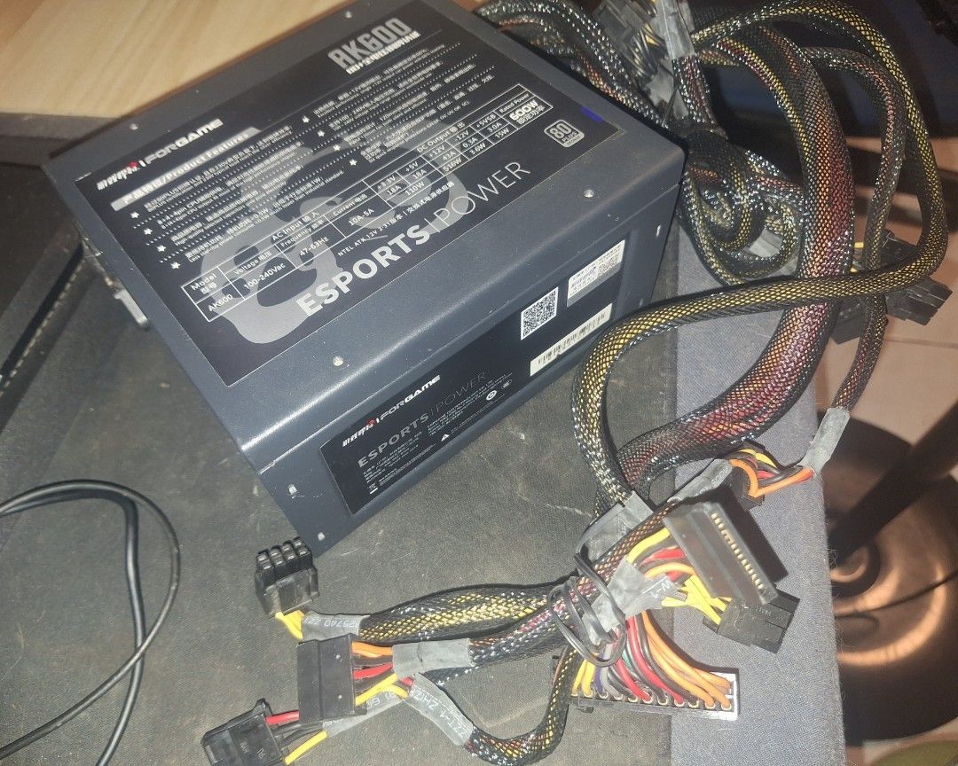 iFORGAME AK600 600W Power Supply Unit (Category: Computer Parts) located in Manila. Submitted by luckyfalcon_1283d9 (Listing ID 1470568183, Image 3). Description: - Brand: iFORGAME AK600 - Power Output: 600W - Efficiency: 80 PLUS Bronze Certified - Input Voltage: 100-240V wide range - Rail: Single +12V output - Cables: Multiple braided cables with SATA and 8-pin connectors - Condition: Clean and 100% ready for a PC build.