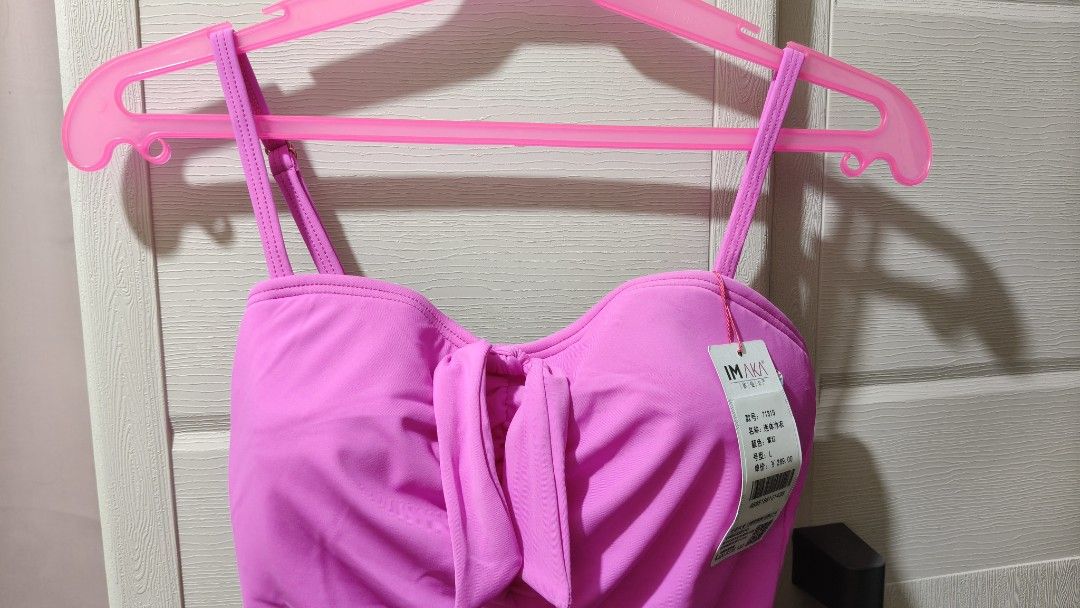 IMK Pink Ruched One-Piece Swimsuit (Category: Bikinis & Swimsuits) located in Taguig. Submitted by suzzyb. (Listing ID 1470725828, Image 2). Description: One-piece swimsuit - Brand: IMK - Color: Bright Pink - Size: L 27-29 - Condition: Brand new with tags (NWT) .