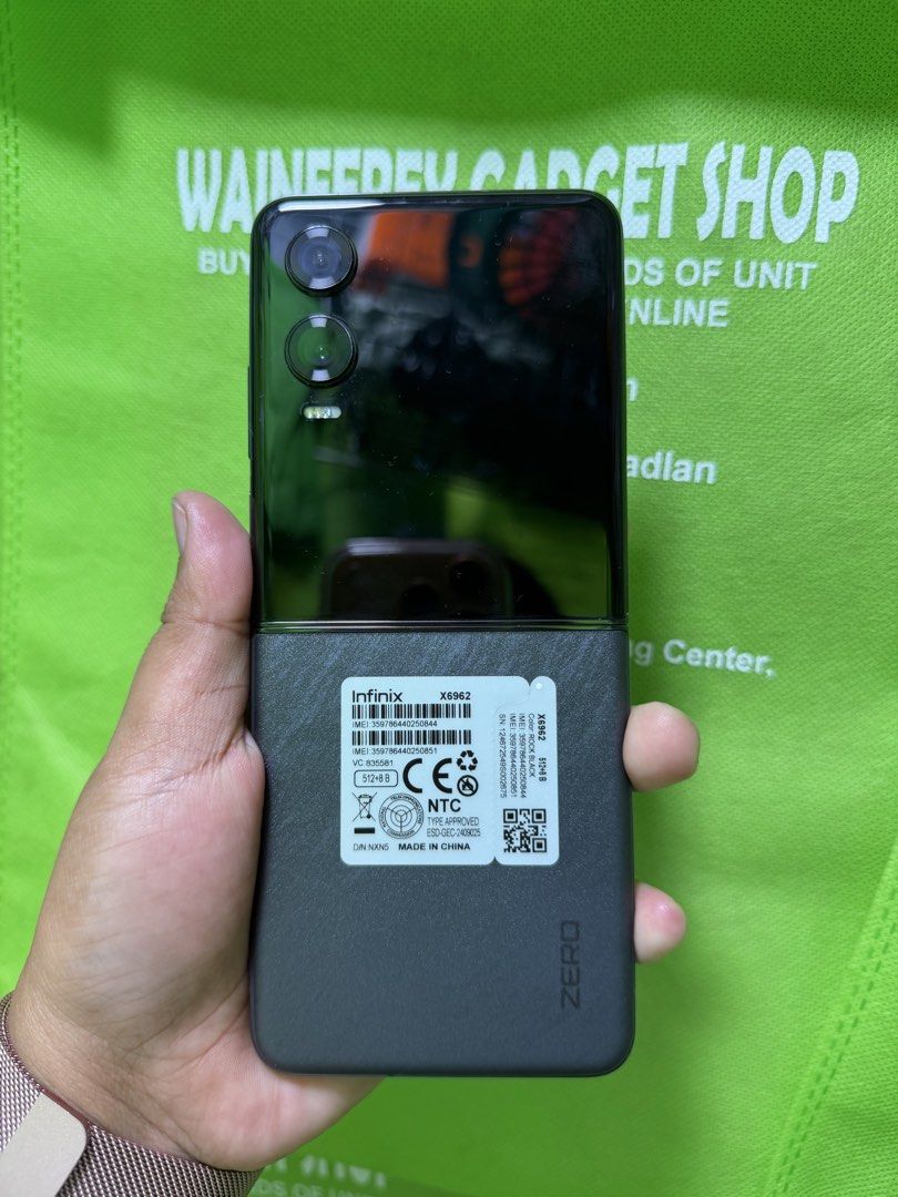 Infinix Zero Flip 8+5/512gb (Category: Android Others) located in San Juan City. Submitted by wainefreygadgetshop (Listing ID 1470666803, Image 2). Description: Infinix Zero Flip 8+5/512 (PLEASE SEARCH MO NALANG FULL SPECS) All GOOD AT WORKING NO HIDDEN ISSUE NO REPAIR HISRTORY SIGNAL TESTED CAMERA TESTED SOUNDS AND SPEAKER TESTED PEDE NA PANG BACK UP PHONE KUNG DIKA MAARTE HONEST ISSUE ILALAGAY SA NOTE KUNG MERON MAN PARA AWARE KA! NO ISSUE GAWA