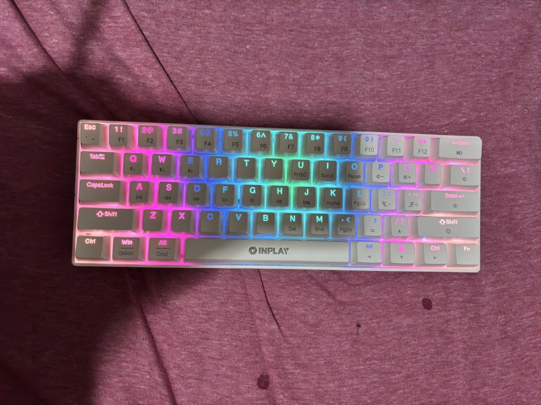 Inplay White Mechanical Gaming Keyboard with RGB Backlight (Category: Computer Keyboard) located in Quezon City. Submitted by injooool (Listing ID 1470728554, Image 2). Description: - Brand/Model: Inplay Mechanical Keyboard - Color: Clean white chassis - Layout: Space-saving 68 keys - Lighting: Vibrant RGB - Features: Clear lettering on keycaps, standard plug-and-play - Best for: Gaming and typing.