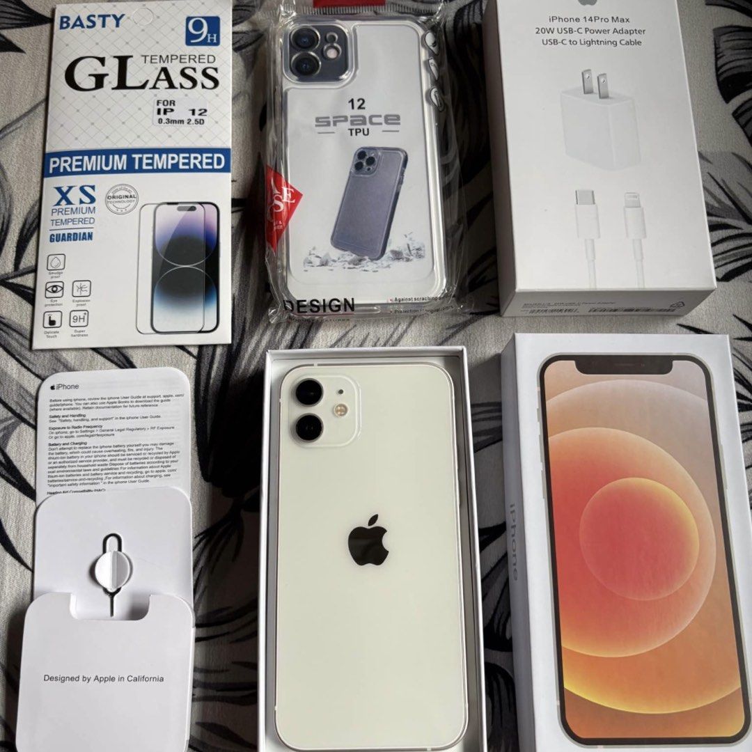 IPHONE 12 128 GB WHITE (Category: iPhone 12 Series) located in Bauang. Submitted by vantro_gadgets (Listing ID 1470559753, Image 1). Description: 🔥 iPhone 12 | 128GB 📱 💰 PRICE: ₱18,500 — FIXED ❌ No Lowballers, Please! ✅ Factory Unlocked | Any SIM 🔋 100% Battery Health* ✅ Face ID & True Tone Working* 📊 3uTools Report Available 📦 Box & Charger Included 🎁 Free Case & Tempered Glass 🤝 Reseller: Ashley Savilla 💬 Message me to order! Features 
